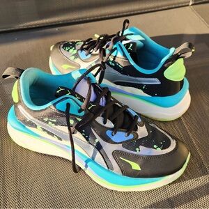 Women’s Puma Glow in the Dark Black and Blue Athletic Shoes